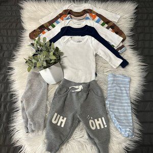 6 long sleeve newborn onesies + 3 pairs of pants. [1B]